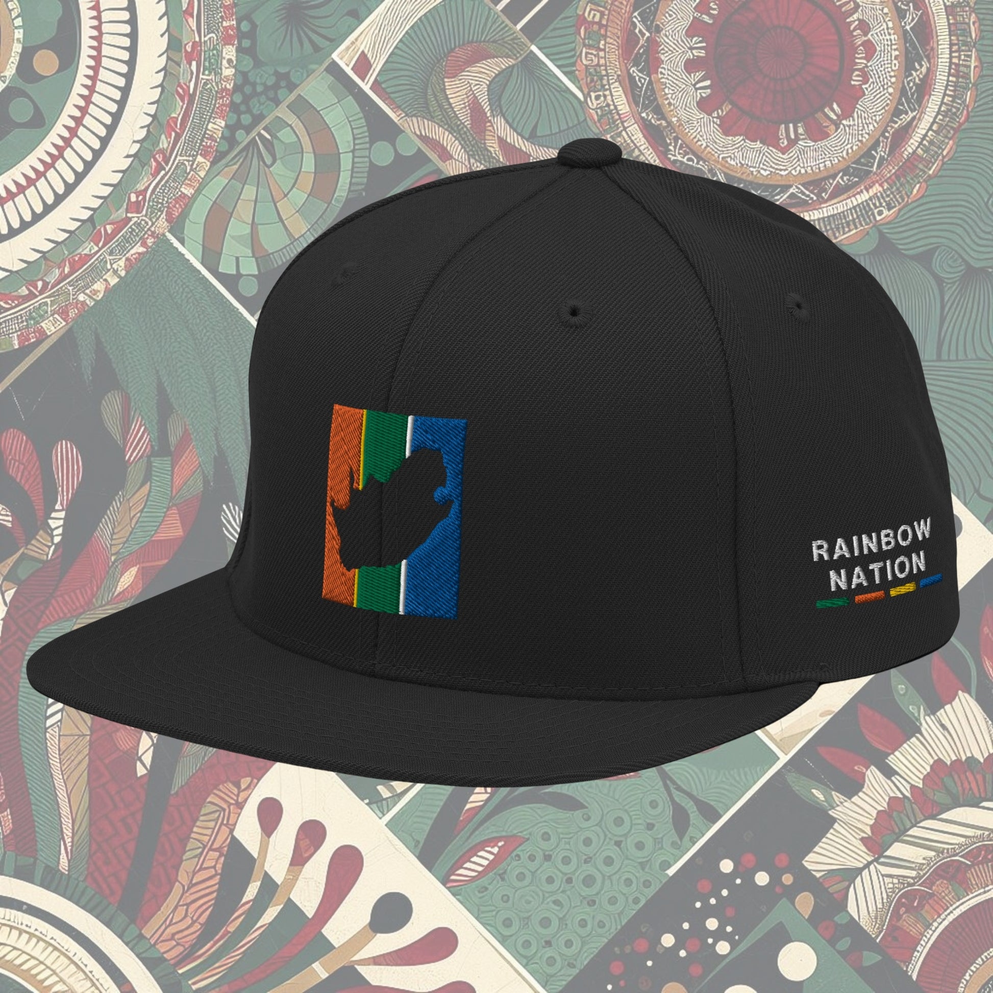 Black South Africa flag snapback with 'Rainbow Nation' written on the side. Features vibrant flag colors and a statement celebrating South Africa's diversity. Ideal for showcasing pride and enhancing your style.
