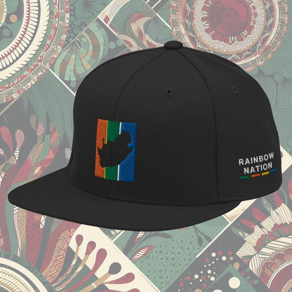 Black South Africa flag snapback with 'Rainbow Nation' written on the side. Features vibrant flag colors and a statement celebrating South Africa's diversity. Ideal for showcasing pride and enhancing your style.