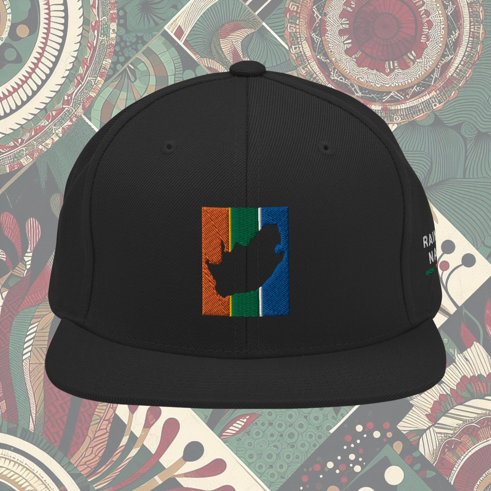 Black South Africa flag snapback with 'Rainbow Nation' written on the side. Features vibrant flag colors and a statement celebrating South Africa's diversity. Ideal for showcasing pride and enhancing your style.