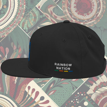 Black South Africa flag snapback with 'Rainbow Nation' written on the side. Features vibrant flag colors and a statement celebrating South Africa's diversity. Ideal for showcasing pride and enhancing your style.
