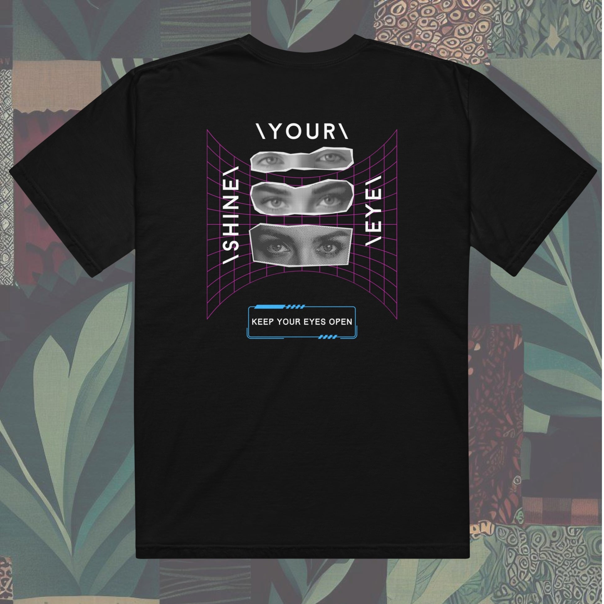 Back of t-shirt featuring 'SYE' on the front and 'Shine Your Eye', 
keep your eyes open on the back, with magazine cut-out eyes and neon streetwear design elements. Bold and edgy, perfect for a standout style.