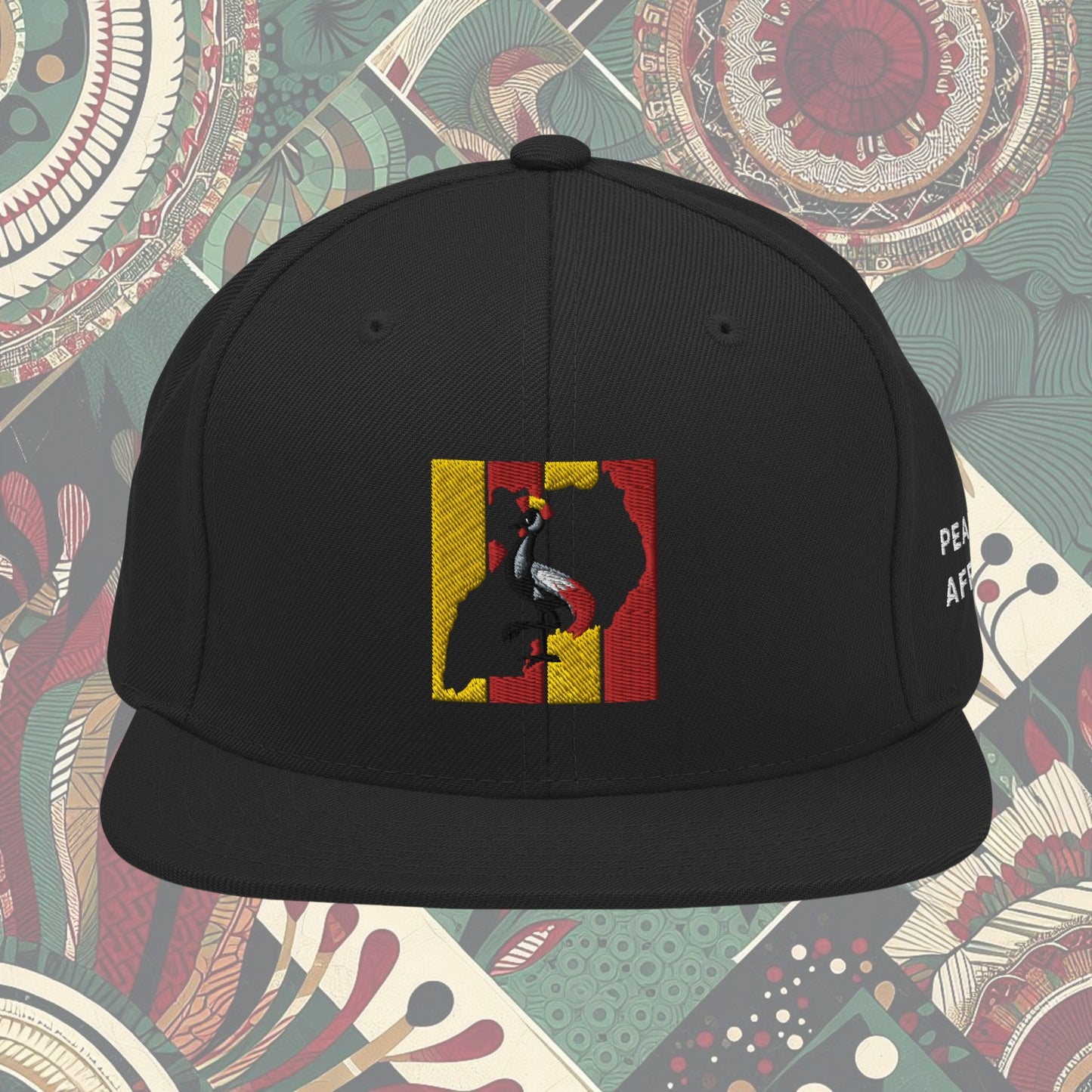 Black Uganda flag snapback with 'Pearl of Africa' written on the side. Vibrant flag colors and a stylish statement piece for showing pride and supporting unique fashion