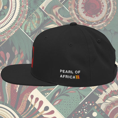 grey brim Uganda flag snapback with 'Pearl of Africa' written on the side. Vibrant flag colors and a stylish statement piece for showing pride and supporting unique fashion