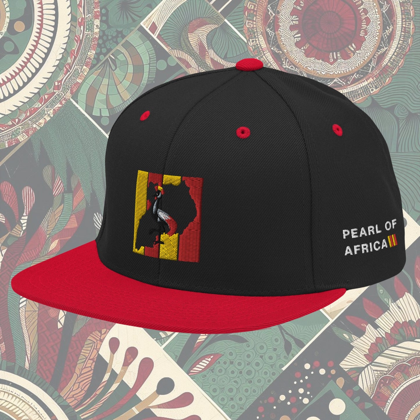 red brim Uganda flag snapback with 'Pearl of Africa' written on the side. Vibrant flag colors and a stylish statement piece for showing pride and supporting unique fashion