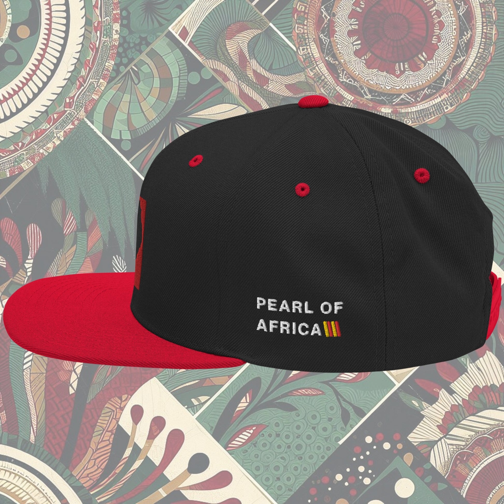 red brim Uganda flag snapback with 'Pearl of Africa' written on the side. Vibrant flag colors and a stylish statement piece for showing pride and supporting unique fashion